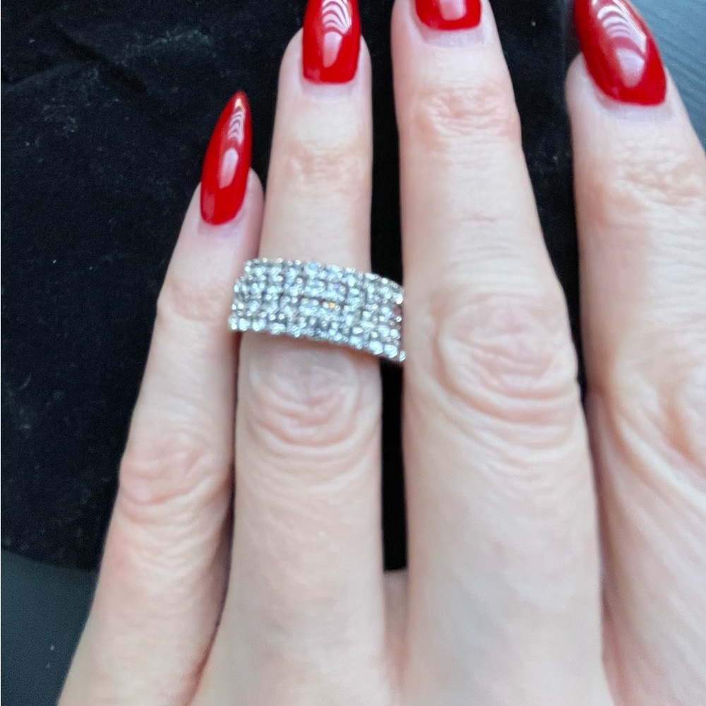 Elegant Silver Band Ring with crystals.